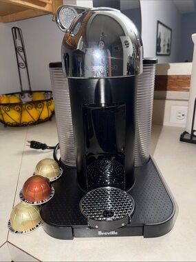 Breville Nespresso VertuoPlus Espresso Machine in Black and Silver Chrome